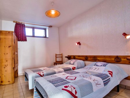 Chambre avec deux lits simples de la Pointe du Jour, appartement 8837 pour 4 personnes