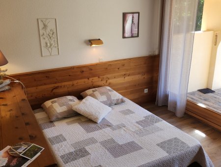 Grand lit Appartement Centaurée