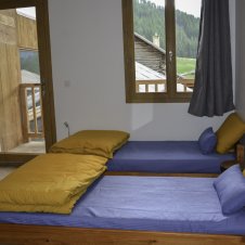 chambre de 4  lits simples donnant sur balcon sud