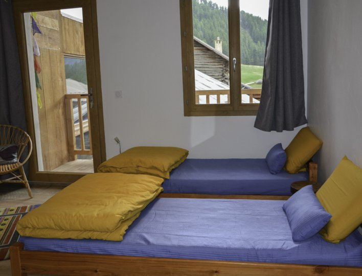 chambre de 4  lits simples donnant sur balcon sud