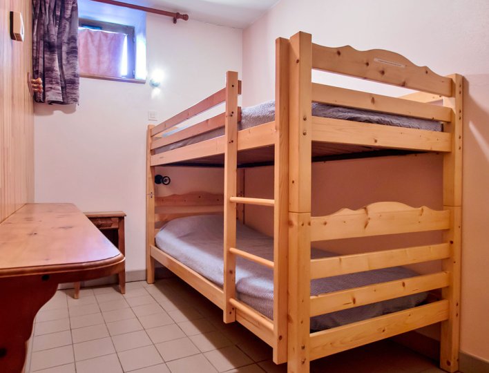 Chambre avec lits surperposés de la Pointe du Jour, appartement 8838 pour 3 personnes
